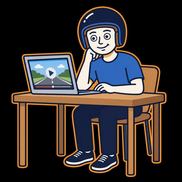 Mascot watching an online road-safety video on a laptop.
